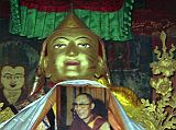 Tibet Lhasa 02 11 Jokhang Inside Tsongkhapa Tsongkhapa (1357-1419) wears the yellow hat of the Gelugpa order, which he founded and now has the Dalai Lama at its head. He is supposedly a manifestation of Manjushri, the Bodhisattva of wisdom. Although there�s no photography allowed, here�s a photo from my 1993 trip. Note the photo of the current Dalai Lama, allowed in 1993 in a period of religious tolerance
